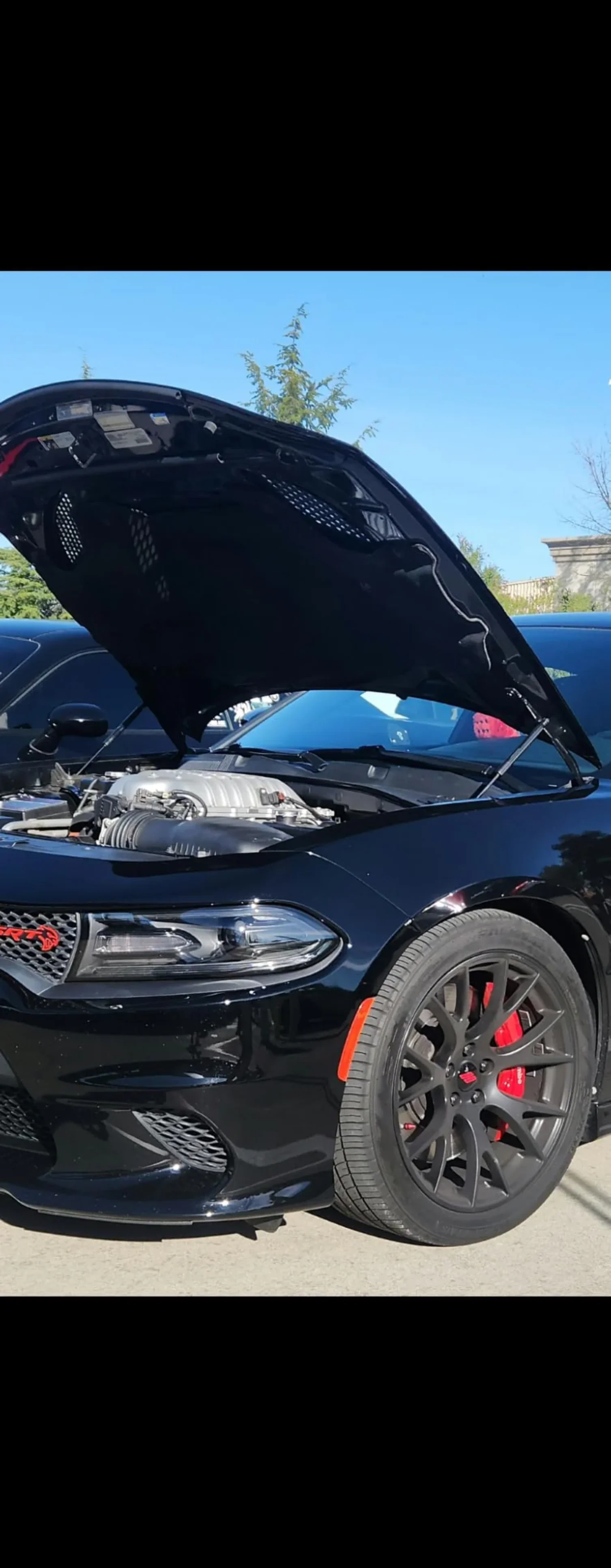 Mia Anderson car with open hood